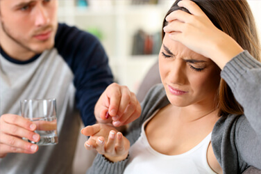 Pfizer, riche des ventes de ses produits contre la Covid, fait une acquisition dans la migraine. Une raison d’investir dans son action ?